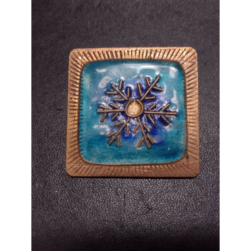 Vintage enamel over copper snowflake brooch